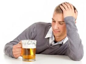man drinking beer as if to leave
