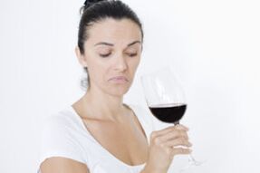 woman drinking wine as to leave